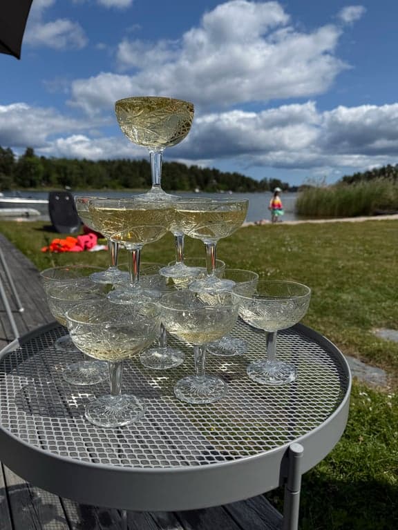 Enjoy a refreshing glass of bubbly whilst taking in the stunning countryside views from the outdoor seating area. Perfect for al fresco dining and entertaining with friends and family in this idyllic Swedish setting.